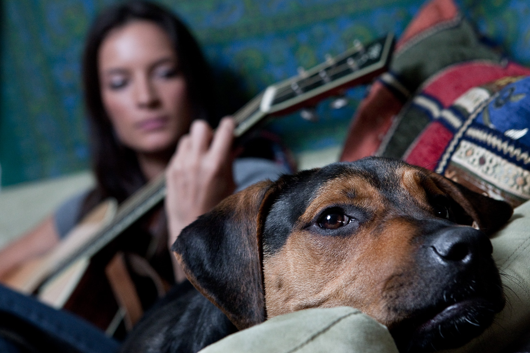 Los Angeles Dog Photography, Michael Brian, Girl playing guitar on couch with dog