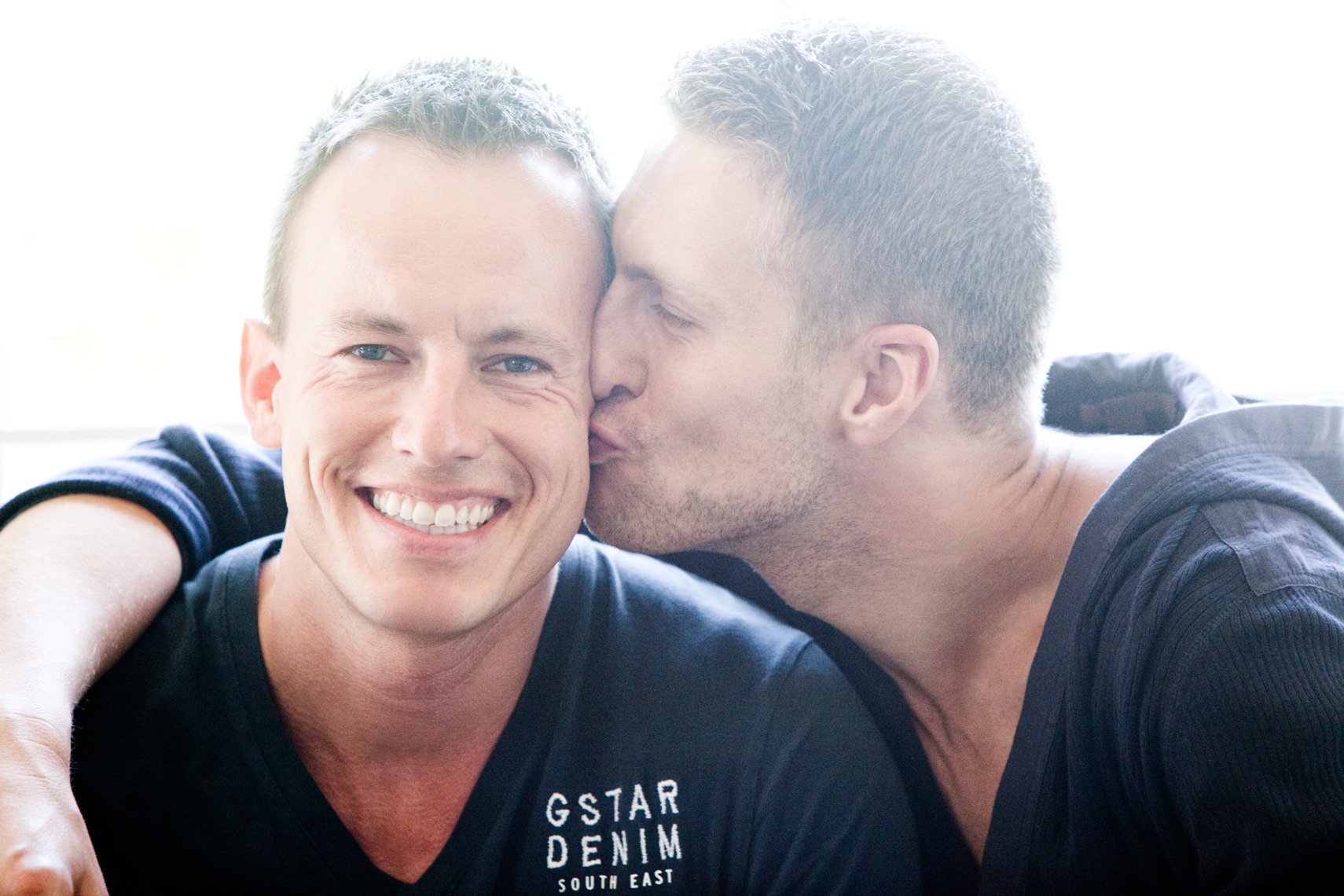 Los Angeles Portrait Photography, Michael Brian, pet, cat, Two men affectionately kiss