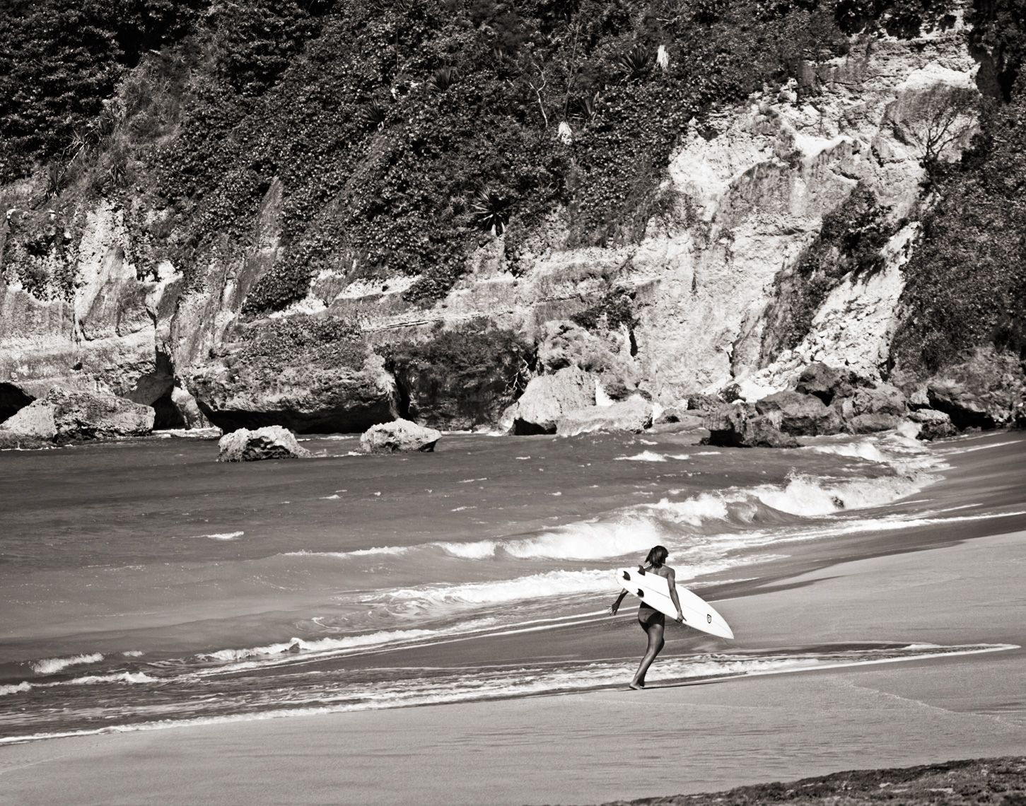 Los Angeles Sports Photography, Michael Brian, dog, pet, cat, lifestyle, Puerto Rican professional surfer Julie Gonzales running on beach in Aguadilla, Puerto Rico